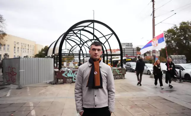 Ilhan Kokor, student of psychology, from Belgrade, 21, poses for a photo ahead of the election in Belgrade, Serbia, Thursday, Oct. 22, 2026. (AP Photo/Petr David Josek)