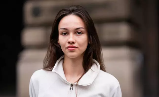 Andja Prica, student of architecture, from Belgrade, 20, poses for a photo ahead of the election in Belgrade, Serbia, Thursday, Oct. 22, 2026. (AP Photo/Petr David Josek)