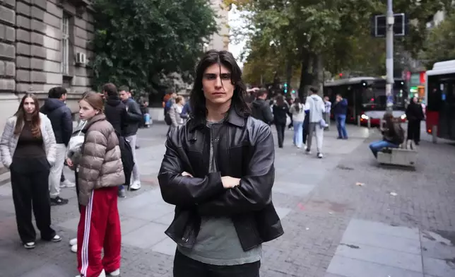 Vuk Nektarijevic, student of mechanical engineering, from Belgrade, 21, poses for a photo ahead of the election in Belgrade, Serbia, Thursday, Oct. 22, 2026. (AP Photo/Petr David Josek)