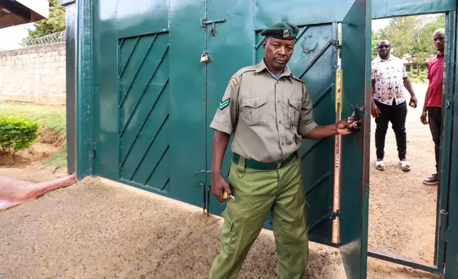 A prison guard stands guard at Maranjau Prison in Murang'a, Kenya, Sept. 11, 2026. (AP Photo/Patrick Ngugi)
