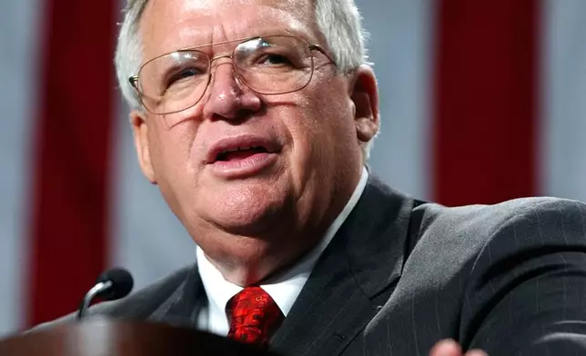 FILE - U.S. House Speaker Dennis Hastert, R-Ill., speaks to supporters during a fundraiser, Saturday, Oct. 20, 2001, in St. Charles, Ill. (AP Photo/Stephen J. Carrera, File)