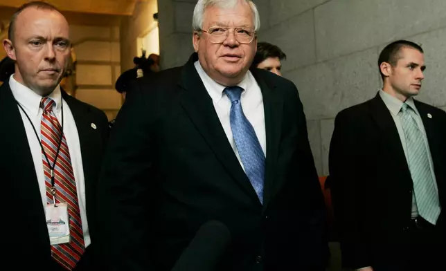 FILE - House Speaker Dennis Hastert, center, arrives on Capitol Hill, Tuesday, Oct. 24, 2006, in Washington, to appear before the House Ethics Committee. (AP Photo/Manuel Balce Ceneta, File)