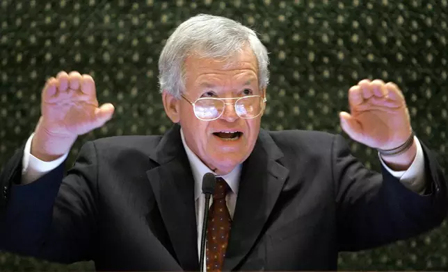 FILE - Former U.S. House Speaker Dennis Hastert speaks to lawmakers on the Illinois House of Representatives floor at the state Capitol in Springfield, Ill., on March 5, 2008. (AP Photo/Seth Perlman, File)