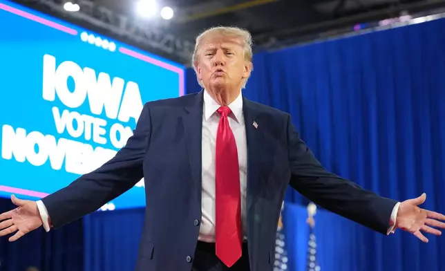 President Donald Trump gestures after speaking at a campaign rally at Sioux Gateway Airport, Thursday, Oct. 22, 2026, in Sioux City, Iowa. (AP Photo/Alex Brandon)