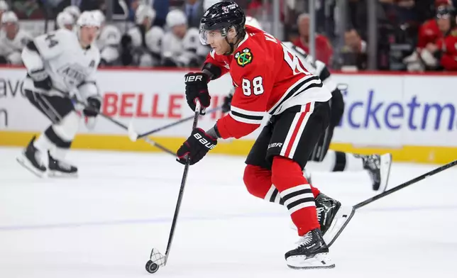 Chicago Blackhawks right wing Patrick Kane (88) skates with the puck during the first period of an NHL hockey game against the Los Angeles Kings, Tuesday, Oct. 27, 2026, in Chicago. (AP Photo/Jessie Alcheh)