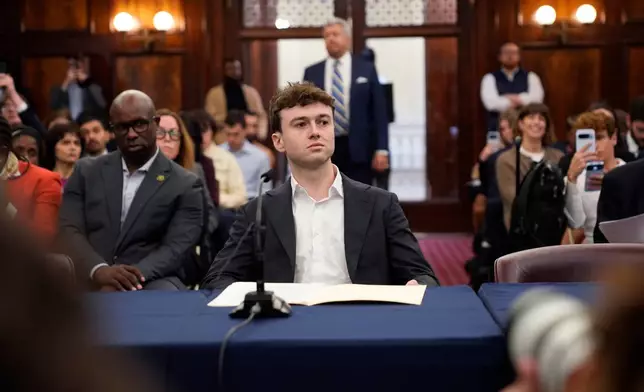 Jacob Coxon gets ready to testify at the New York City Council hearing on artificial intelligence safety in New York, Monday, Oct. 5, 2026. (AP Photo/Seth Wenig)
