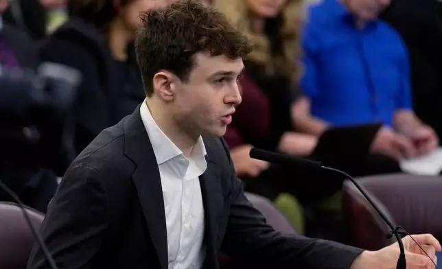 Jacob Coxon testifies at the New York City Council hearing on artificial intelligence safety in New York, Monday, Oct. 5, 2026. (AP Photo/Seth Wenig)