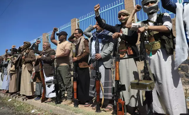 Houthi supporters chant slogans during an armed tribal rally in Sanaa, Yemen, Wednesday, Oct. 7, 2026. (AP Photo/Osamah Abdulrahman)