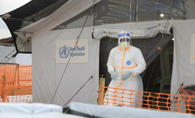 A health worker wears full gear at a Ebola treatment camp in Butembo, Congo, Wednesday, Sept. 30, 2026. (AP Photo/Sebastien Kitsa Musayi)