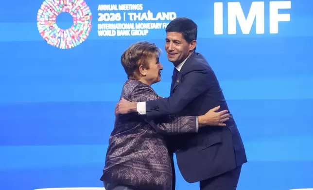 International Monetary Fund (IMF) Managing Director Kristalina Georgieva, left, and U.S. Federal Reserve Chairman Kevin Warsh greet after speaking at the annual meetings of the International Monetary Fund and the World Bank Group in Bangkok, Thailand, Friday, Oct. 16, 2026. (AP Photo/Dhitaraht Dhanarahtsombat)