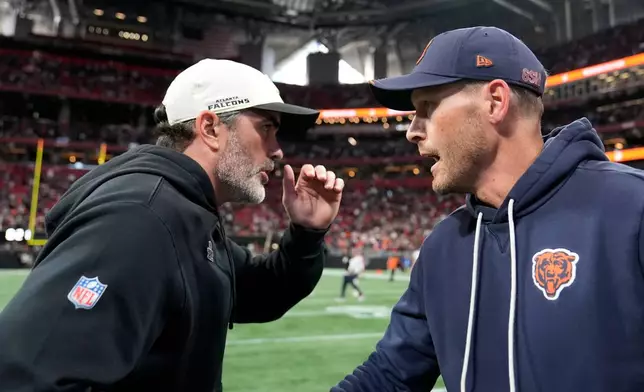 Atlanta Falcons head coach Kevin Stefanski, left, congratulates Chicago Bears head coach Ben Johnson after an NFL football game in Atlanta, Sunday, Oct. 18, 2026. (AP Photo/Brynn Anderson)