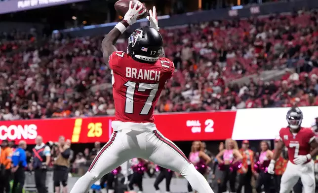 Atlanta Falcons wide receiver Zachariah Branch (17) catches a pass for a two-point conversion against the Chicago Bears during the second half of an NFL football game in Atlanta, Sunday, Oct. 18, 2026. (AP Photo/Mike Stewart)