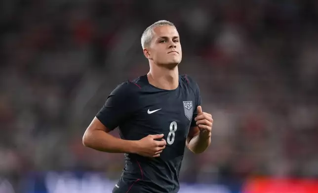 FILE - United States' Cavan Sullivan jogs in action during the second half of an international friendly soccer match against the Chile, Sept. 29, 2026, in St. Louis. (AP Photo/Jeff Roberson, File)