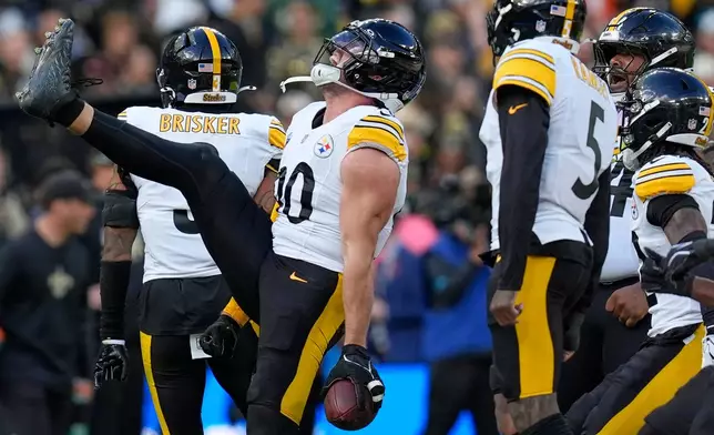 Pittsburgh Steelers linebacker T.J. Watt (90) reacts after a turnover on New Orleans Saints quarterback Tyler Shough (6) was overturned on a flag during an NFL football game in Saint-Denis, outside Paris, Sunday, Oct. 25, 2026. (AP Photo/Steve Luciano)