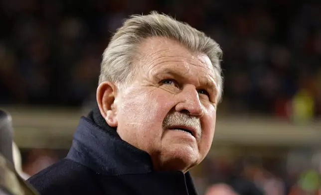 FILE - Former Chicago Bears player and football coach Mike Ditka waits for the halftime ceremony where his No. 89 was to be retired by the Bears during an NFL football game between the Bears and the Dallas Cowboys, Monday, Dec. 9, 2013, in Chicago. (AP Photo/Nam Y. Huh, File)