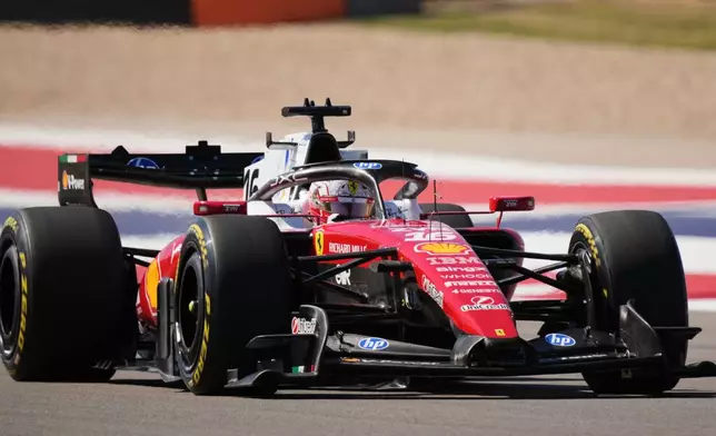Ferrari driver Charles Leclerc of Monaco steers his car out of a turn during the first practice session for the Formula One United States Grand Prix auto race at Circuit of the Americas in Austin, Texas, Friday, Oct. 23, 2026. (AP Photo/Eric Gay)