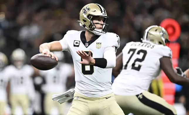 New Orleans Saints quarterback Tyler Shough passes against the Atlanta Falcons during the first half of an NFL football game in New Orleans, Monday, Oct. 5, 2026. (AP Photo/Ella Hall)