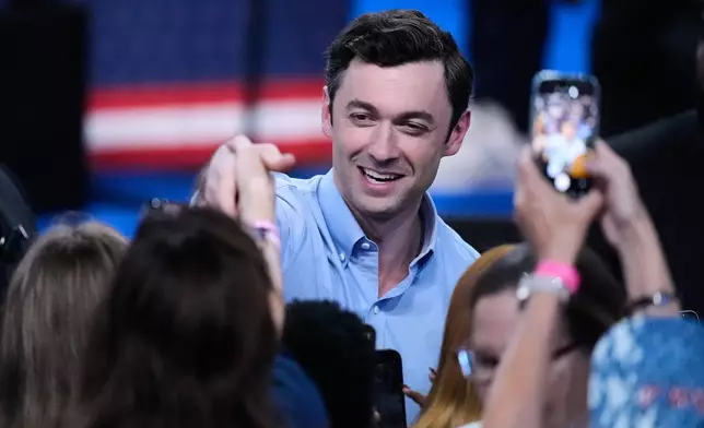 Democratic candidate Sen. Jon Ossoff greets supporters after a rally ahead of the Georgia Primary Election on Wednesday, Oct. 28, 2026, Morrow, Ga. (AP Photo/Brynn Anderson)