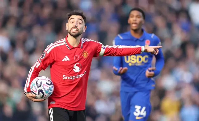 Manchester United's Bruno Fernandes reacts during the English Premier League soccer match between Chelsea and Manchester United in London, Saturday, Oct. 31, 2026. (AP Photo/Ian Walton)