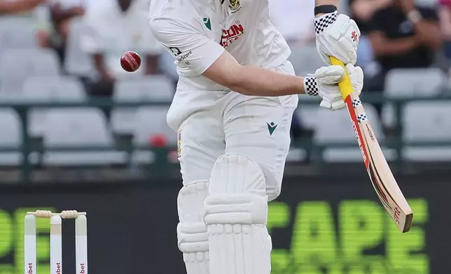 South Africa's Simon Harmer bats on day one of the third cricket test match between South Africa and Australia in Cape Town, South Africa, Tuesday, Oct. 27, 2026. (AP Photo/Halden Krog)