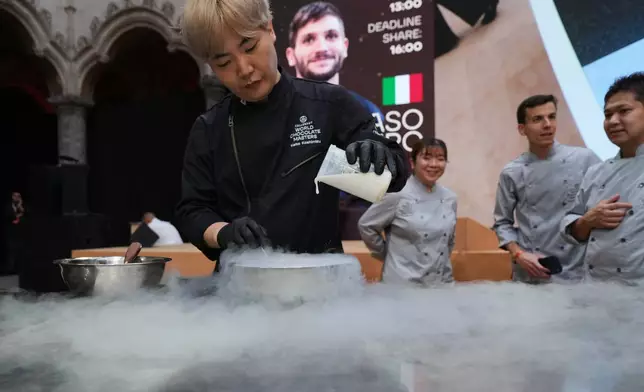 Japan's Keita Koshimizu competes during the World Chocolate Masters event in Antwerp, Belgium, Tuesday, Oct. 27, 2026. (AP Photo/Virginia Mayo)