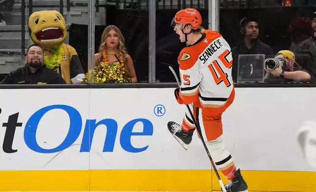 Anaheim Ducks right wing Beckett Sennecke (45) celebrates after scoring against the Vegas Golden Knights during the first period of an NHL hockey game Friday, Oct. 2, 2026, in Las Vegas. (AP Photo/John Locher)