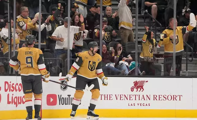 Vegas Golden Knights center Tomas Hertl (48) celebrates after scoring against the Anaheim Ducks during the third period of an NHL hockey game Friday, Oct. 2, 2026, in Las Vegas. (AP Photo/John Locher)