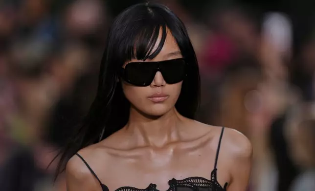 A model wears a creation as part of the Stella McCartney Womenswear Spring Summer 2027 collection presented in Paris, France, Wednesday, Sept. 30, 2026. (AP Photo/Aurelien Morissard)
