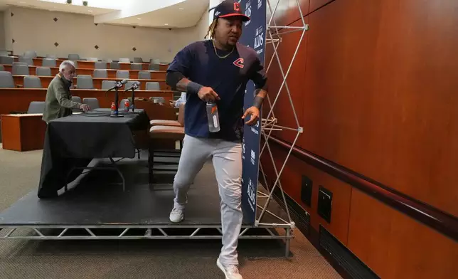 Cleveland Guardians' Jose Ramirez leaves after a baseball press conference, Tuesday, Oct. 6, 2026, in Chicago, ahead of Wednesday's Game 3 in the American League Division Series against the Chicago White Sox. (AP Photo/Nam Y. Huh)