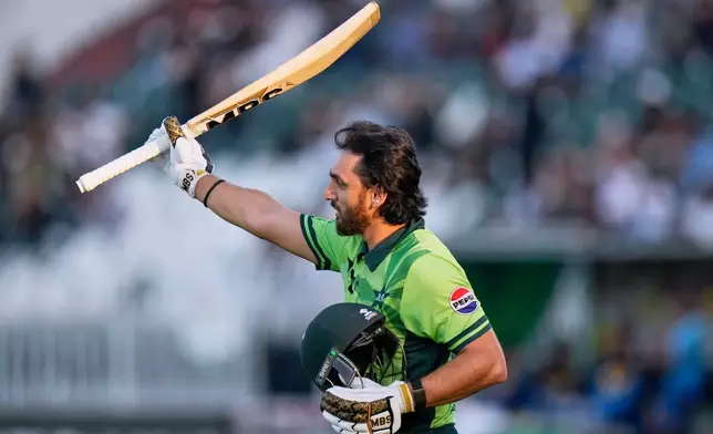 Pakistan's Salman Ali Agha reacts as he walks off the field after his dismissal during the tri-series one-day international cricket match between Pakistan and Sri Lanka, in Rawalpindi, Pakistan, Sunday, Oct. 18, 2026. (AP Photo/Anjum Naveed)