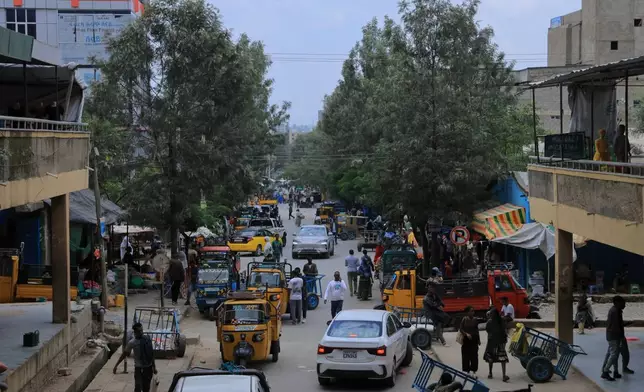 FILE - People walk in Mekelle, the capital of Ethiopia's Tigray region, as fighting escalates with the central government, Thursday, Sept. 24, 2026. (AP Photo, File)