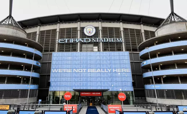 FILE - A exterior shot of the stadium before the English Premier League soccer match between Manchester City and Arsenal at the Etihad Stadium in Manchester, England, Wednesday, June 17, 2020. (Peter Powell/Pool via AP, File)