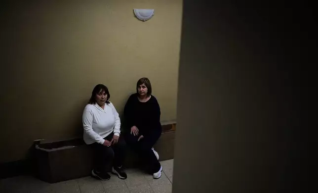Rosana Vaccon, left, and Andrea Martínez, part of a group of women who allege they were subjected to human trafficking and forced labor at Opus Dei centers in Argentina, pose for a photo in Buenos Aires, Tuesday, Sept. 1, 2026. (AP Photo/Natacha Pisarenko)