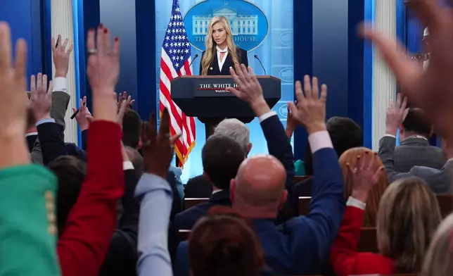 White House press secretary Katie Zacharia speaks with reporters in the James Brady Press Briefing Room at the White House, Tuesday, Oct. 13, 2026, in Washington. (AP Photo/Julia Demaree Nikhinson)