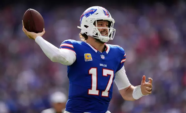 Buffalo Bills quarterback Josh Allen (17) passes against the New England Patriots in the first half during an NFL football game in Orchard Park, N.Y., Sunday, Oct. 4, 2026. (AP Photo/Carolyn Kaster)