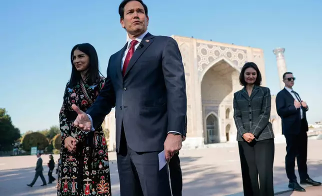 US Secretary of State Marco Rubio speaks to the press next to Uzbekistan's Head of the Presidential Administration Saida Mirziyoyeva at Registan Square in Samarkand, Uzbekistan, Monday, Oct. 19, 2026. (Kylie Cooper/Pool Photo via AP)