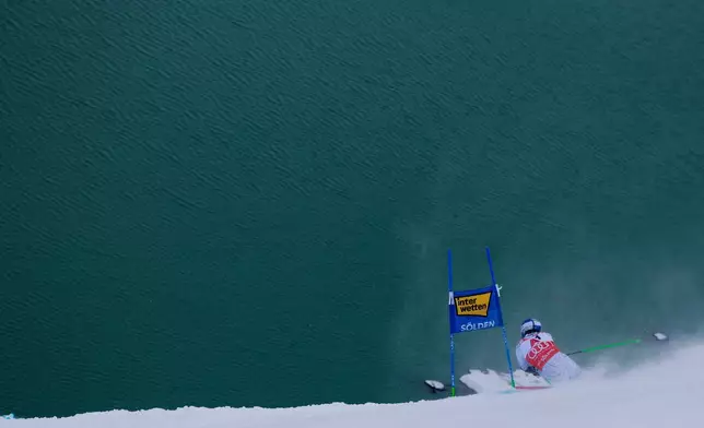 Brazil's Lucas Pinheiro Braathen competes in an alpine ski, men's World Cup giant slalom, in Soelden, Austria, Sunday, Oct. 25, 2026. (AP Photo/Alessandro Trovati)