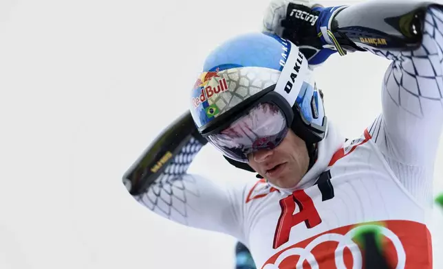 Brazil's Lucas Pinheiro Braathen concentrates at the start of an alpine ski, men's World Cup giant slalom, in Soelden, Austria, Sunday, Oct. 25, 2026. (AP Photo/Gabriele Facciotti)