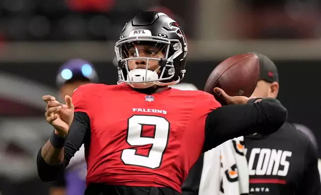Atlanta Falcons quarterback Michael Penix Jr. warms up before an NFL football game against the Baltimore Ravens, Sunday, Oct. 11, 2026, in Atlanta. (AP Photo/Mike Stewart)