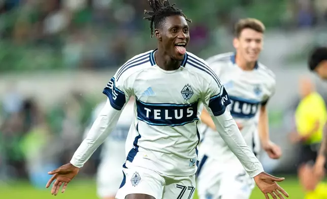 Vancouver Whitecaps forward Yadaly Diaby (77) celebrates a goal against Austin FC during the second half of an MLS soccer match in Austin, Texas, Saturday, Oct. 17, 2026. (AP Photo/Stephen Spillman)