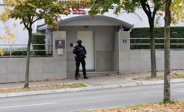 Serbian gendarmes guard the Israeli Embassy after an unidentified assailant attacked a guard with knives in Belgrade, Serbia, Wednesday, Oct. 28, 2026. (AP Photo/Darko Vojinovic)