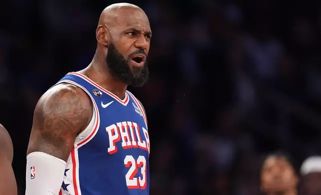 Philadelphia 76ers forward LeBron James yells during the second half of an NBA basketball game against the New York Knicks Tuesday, Oct. 20, 2026, in New York. (AP Photo/Frank Franklin II)
