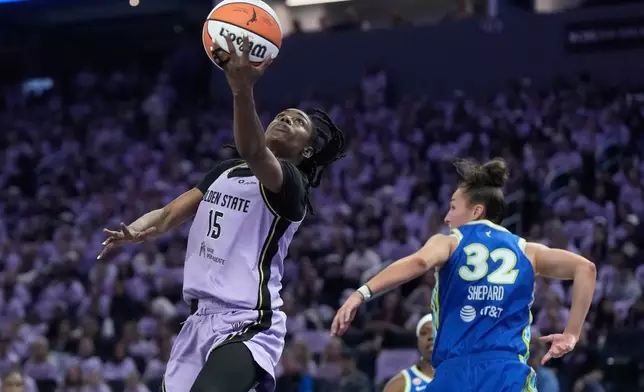 Golden State Valkyries guard Tiffany Hayes (15) shoots against Dallas Wings forward Jessica Shepard (32) during the first half of Game 3 of a WNBA basketball first-round playoff series, Friday, Oct. 2, 2026, in San Francisco. (AP Photo/Jeff Chiu)