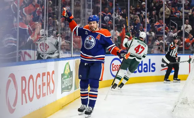 Edmonton Oilers' Leon Draisaitl (29) celebrates a goal against the Minnesota Wild during during the second period of an NHL hockey game in Edmonton, Tuesday, Oct. 20, 2026. (Codie McLachlan/The Canadian Press via AP)
