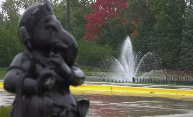 A statue and fountain are displaued outside of Sri Venkateswara Swami (Balaji) Temple in Aurora, Ill., Thursday, Oct. 15, 2026. (AP Photo/Laura Bargfeld)