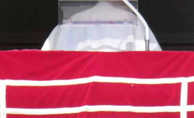 Pope Leo XIV leaves at the end the Angelus prayer in St. Peter's Square at the Vatican, Sunday, Oct. 11, 2026. (AP Photo/Gregorio Borgia)