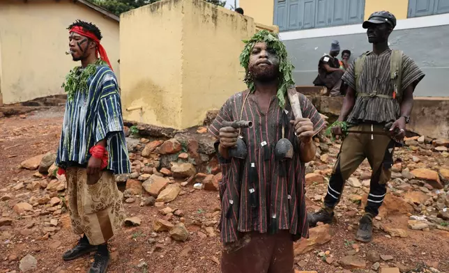 People participate in a re-enactment of the Akatamanso War during the Odwira Festival celebrations in Larteh, Ghana, Wednesday, Sept. 30, 2026. (AP Photo)