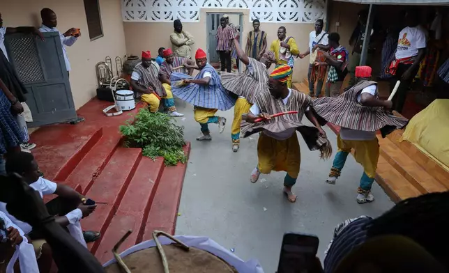 Traditional dancers perform at the Akuapem State's 200th anniversary celebration of the Odwira Festival in Akropong, Ghana, Friday, Sept. 25, 2026. (AP Photo)