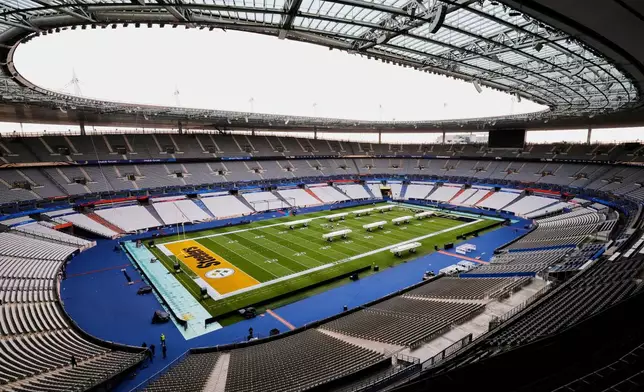A general view of the Stade de France with NFL field marking on Thursday, Oct. 22, 2026, in Saint-Denis, north of Paris, ahead of Sunday's game between the Pittsburgh Steelers and the New Orleans Saints. (AP Photo/Greg Payan)
