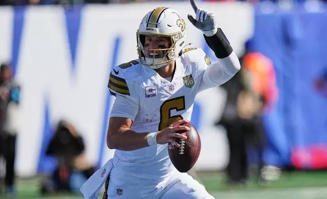 New Orleans Saints quarterback Tyler Shough (6) looks to pass during the first half of an NFL football game against the New York Giants in East Rutherford, N.J., Sunday, Oct. 18, 2026. (AP Photo/Frank Franklin II)